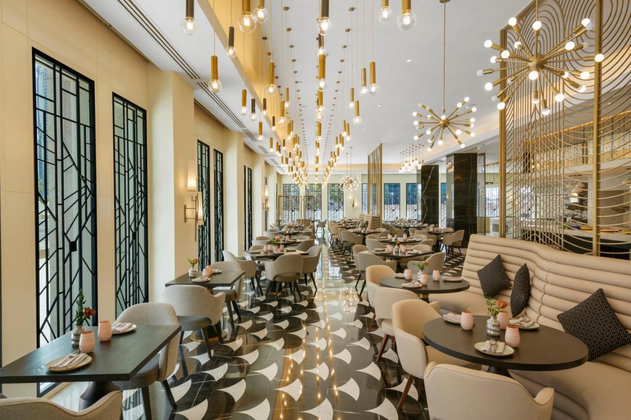 Wyndham Grand Doha West Bay Beach ภายนอก รูปภาพ The restaurant